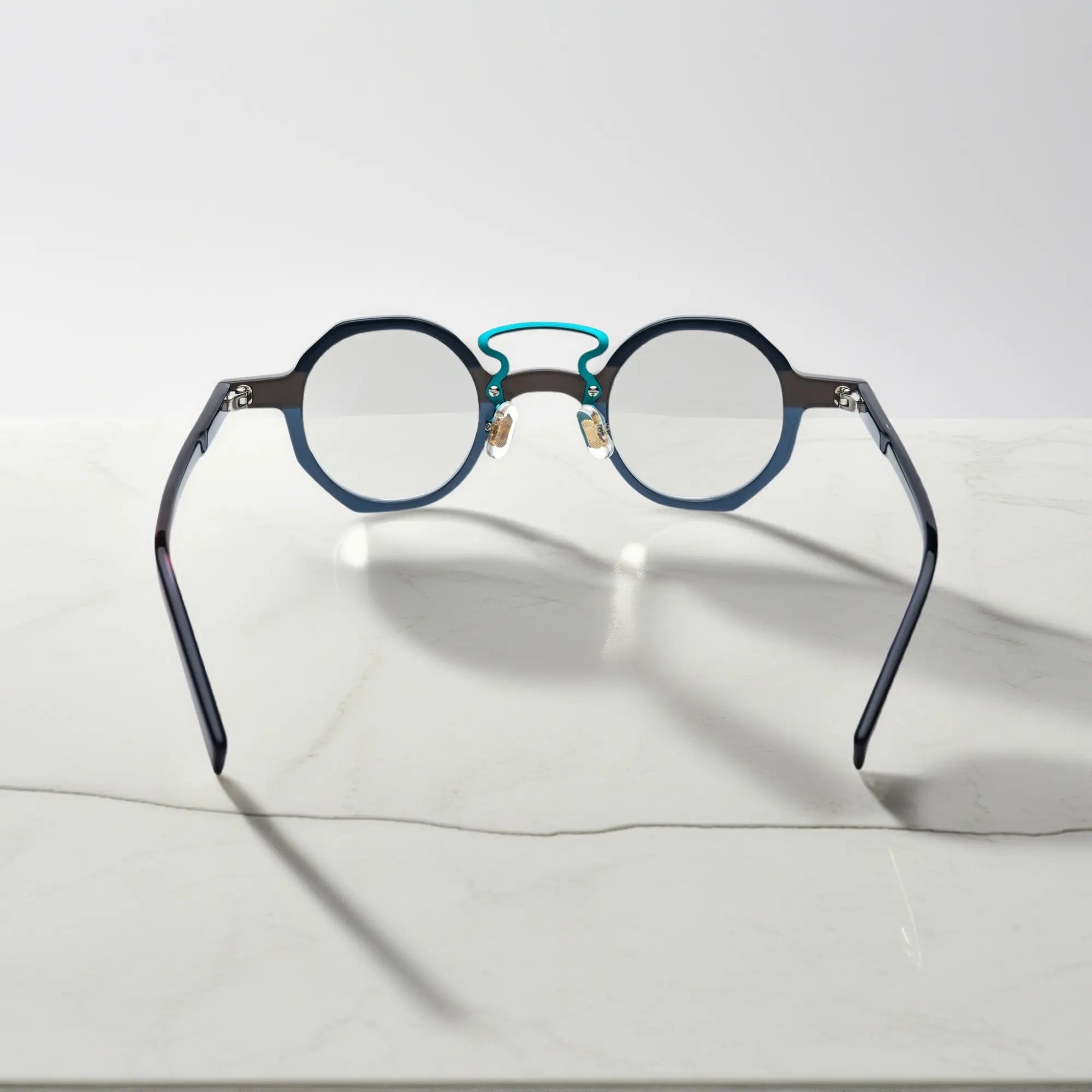 Angled perspective showing VoyueLens™ VL19244 Forest Grey Mist lightweight geometric eyeglasses